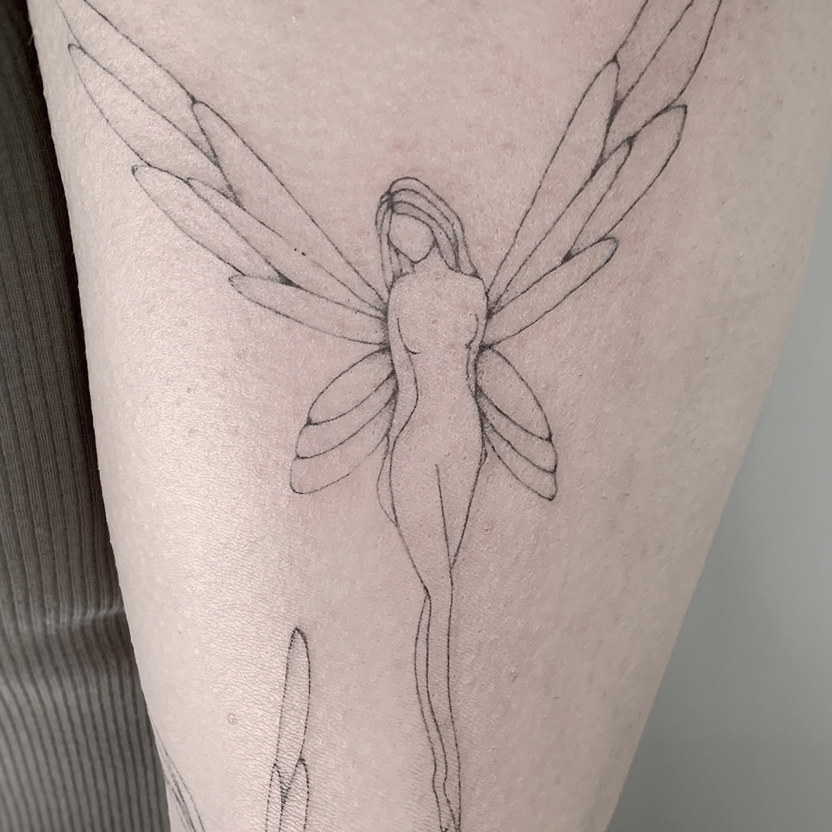 Fineline Tattoo